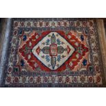 A Turkish Kars carpet, 263 cm x 210 cm