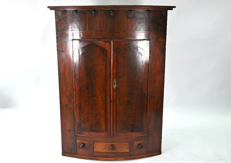 Mahogany bowfront hanging corner cupboard