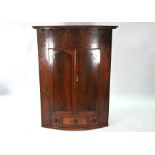 Mahogany bowfront hanging corner cupboard