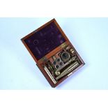 Carpenter & Westley, London, a 19th century mahogany cased brass travel microscope