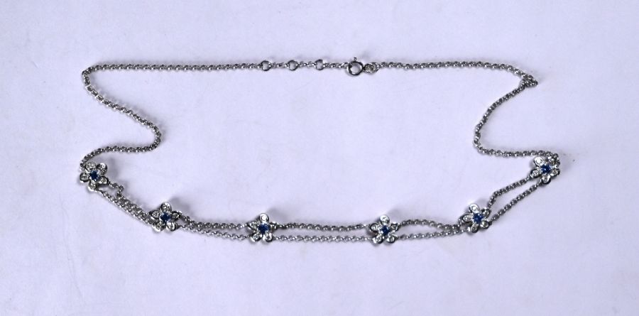 A white metal sapphire and diamond flower necklet, - Image 3 of 5