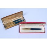 A boxed Parker 51 fountain pen and pencil set to/w a Waterman's fountain pen