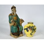 A Chinese cloisonné phoenix vase and sancai-glazed court official, Qing and later