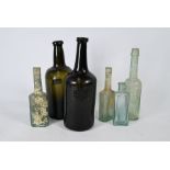 18th century green glass bottle of mallet form