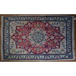 A small Persian Kirman rug