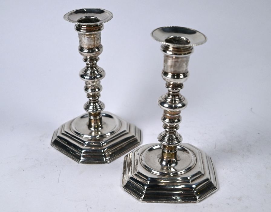 Pair of William III Britannia standard candlesticks, Andrew Raven, London 1699