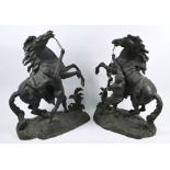 A pair of large antique cast spelter 'Marley Horses'