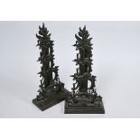 A pair of 19th century brown patinated bronze Rococo revival slotted stationery stands