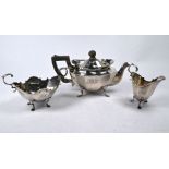 An Edwardian silver three-piece bachelor tea service