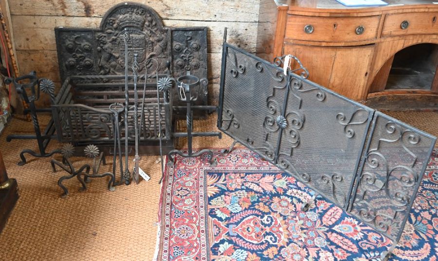 An Arts & Crafts wrought and cast iron fire basket etc.