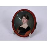 A Regency oval portrait miniature on ivory of a young lady