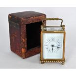 A small late 19th century brass carriage clock