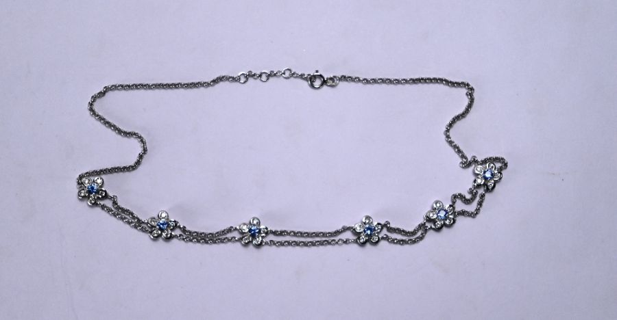 A white metal sapphire and diamond flower necklet, - Image 4 of 5