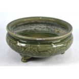 A Chinese celadon tripod censer, Ming dynasty (1368-1644)