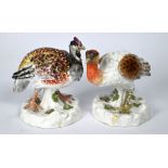 A pair of antique porcelain guinea fowl