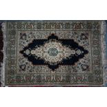 An Indo-Persian rug, 210 cm x 138 cm