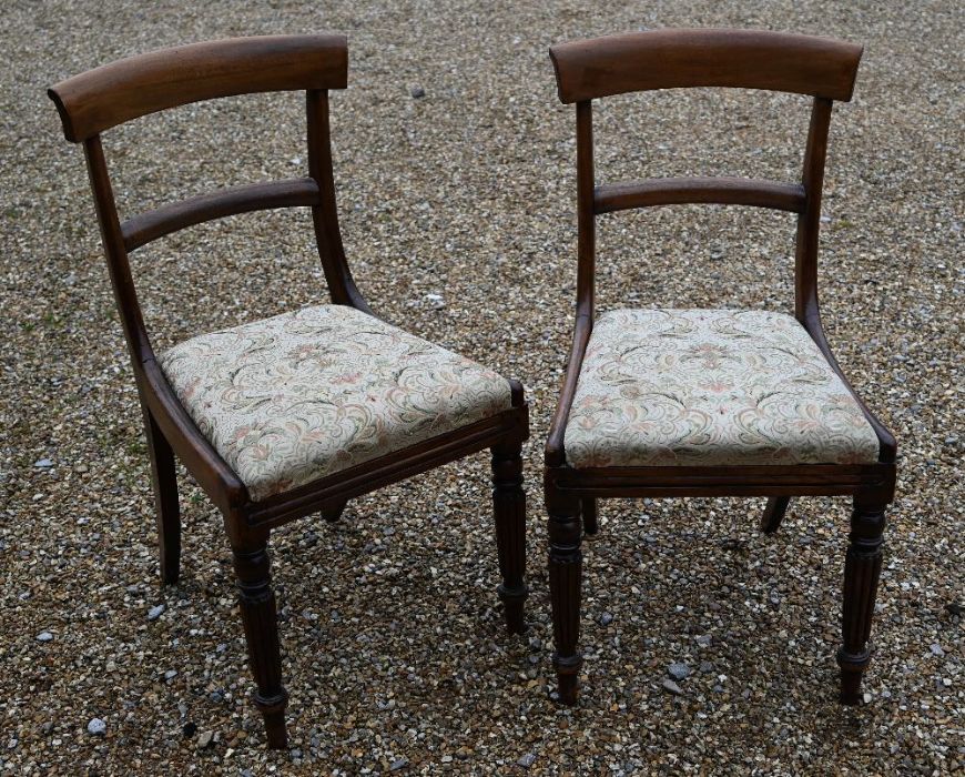 A set of six Regency mahogany bar back dining side chairs