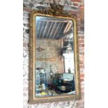 An antique French Empire style gilt framed mirror
