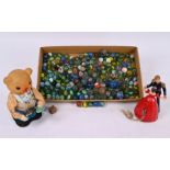 A tinplate clockwork teddy bear, clockwork waltzing couple and collection of marbles