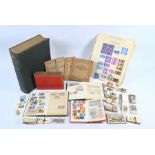 Victorian and later stamp album and small quantity of cigarette cards