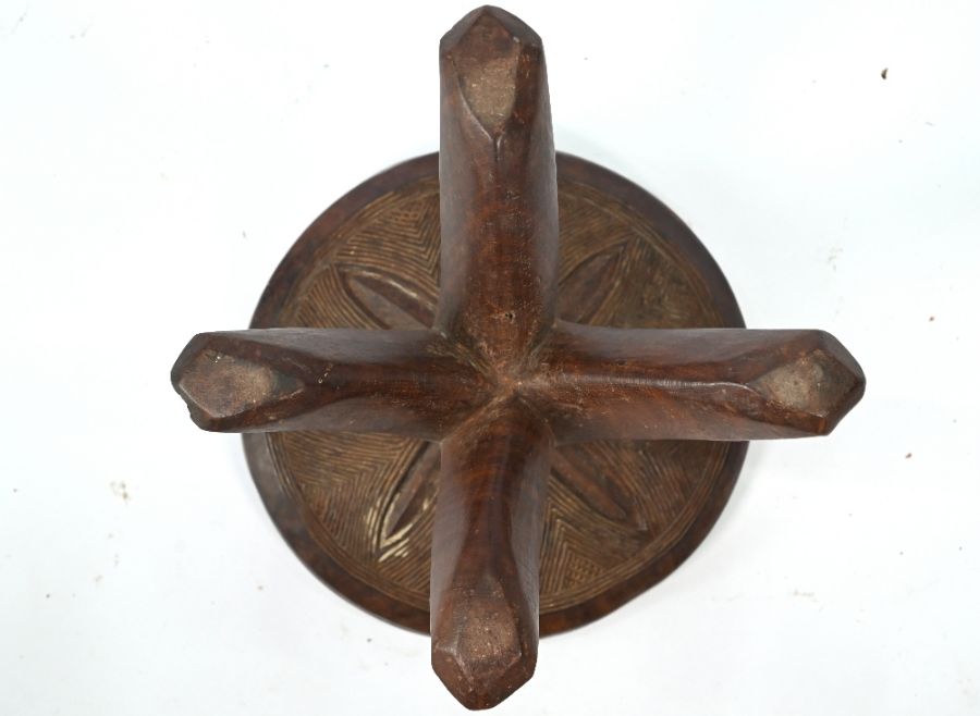 An old carved hardwood tripod stool of African origin - Image 4 of 5