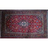 A Persian Kashan rug