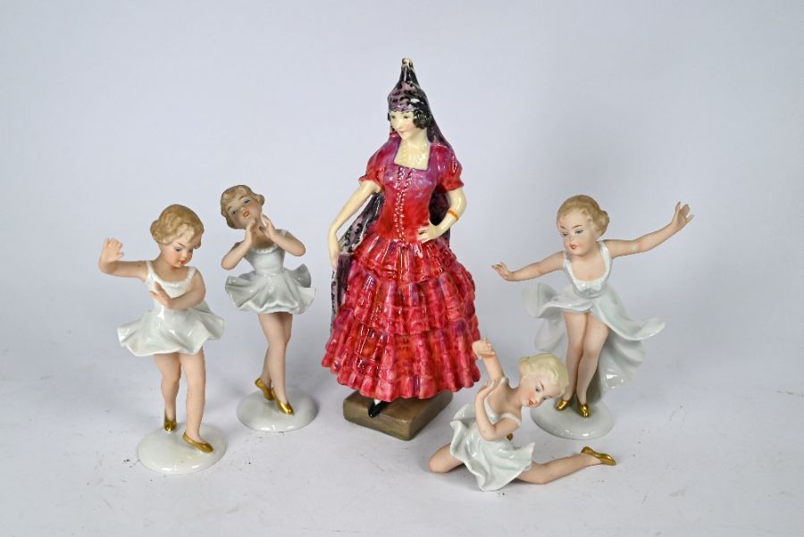 A Royal Doulton figure and four Goebels figures