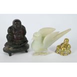 A 20th century Chinese jade bird to/w simulated amber Budai and brass Budai