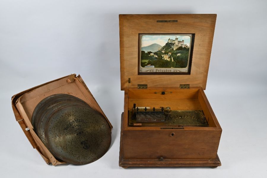 A floral marquetry walnut cased Polyphon, to/w thirteen discs