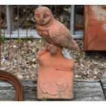 A composite terracotta 'owl' finial roof tile
