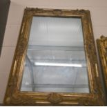 A gilt gesso-framed wall mirror, 88 x 68 cm