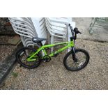 A Mongoose Menace lime green BMX