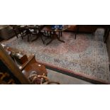 An Indo-Persian salmon ground carpet, 440 x 315