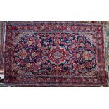 An old Persian hamadan rug, 199 cm x 127 cm
