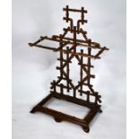 A Victorian style enamelled cast iron faux bamboo stick stand