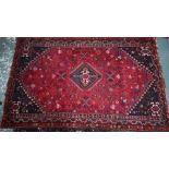 A Persian Shiraz carpet, 274 cm x 172 cm