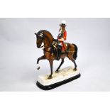 A Michael Sutty porcelain equestrian group