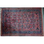 A Persian Hamadan rug, 212 cm x 141 cm