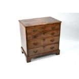 A George III mahogany chest of four long graduated drawers