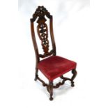 An antique Dutch high-back walnut chair
