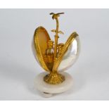 A Victorian gilt metal and shell scent bottle holder