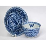 A Chinese blue and white tea bowl and sauccer, Kangxi (1664-1722) period, Qing