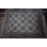 A Persian Kashan carpet, 380 cm x 290 cm