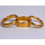 Three 22ct wedding bands