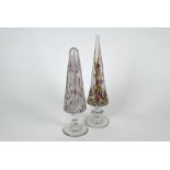 A conical glass 'Devil's Fire' obelisk paperweight