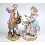 A pair of Meissen figures