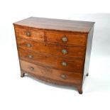 A George III inlaid mahogany bow-front chest of drawers, 111 cm w x 58 cm x 94.5 cm h