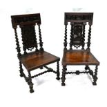 A large companion pair of antique oak hall-chairs (2)