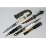 Three various knives/daggers