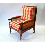 A Victorian mahogany bergère armchair
